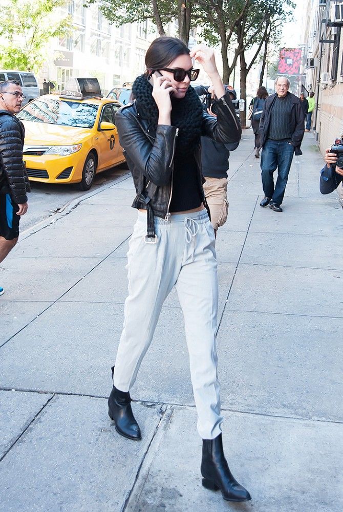Kendall Jenner in a leather moto jacket and drawstring pants | Photo: Who What Wear